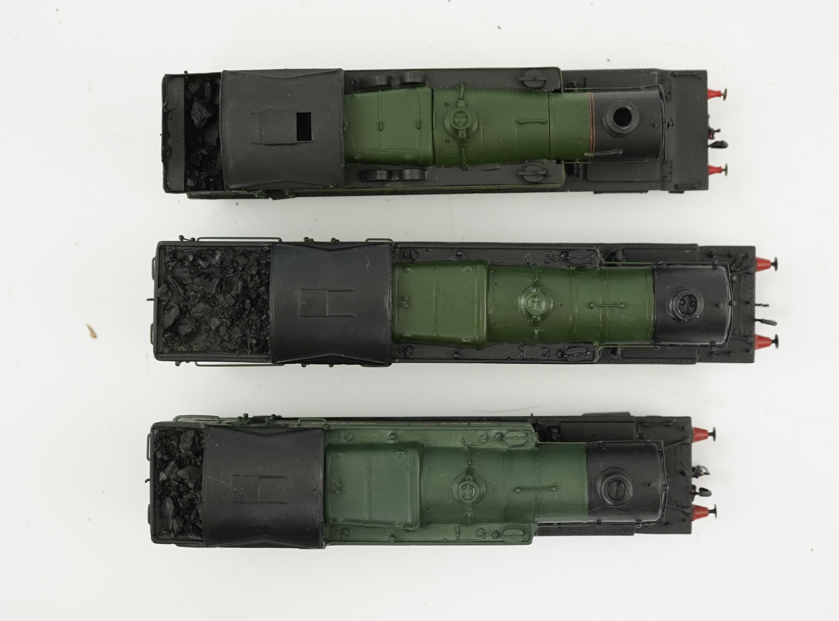 Three 00 gauge kit built GWR tank locomotives, two brass and white metal; a 42xx class 2-8-0T, 4200, together with an 72xx class 2-8-2T, 7200, plus a plastic/resin and metal 22xx class 4-4-2T, 2222, all constructed, pain